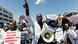A doctor with a loud hailer shouts slogans during a protest march by senior medical doctors in Harare A doctor with a loud hailer shouts slogans during a protest march by senior medical doctors in Harare