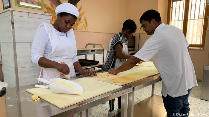 In the kitchen of Casa Agata, women learn how to make pasta