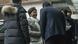 Carrie Lam arrives in Beijing on Saturday wearing a white scarf Carrie Lam arrives in Beijing on Saturday wearing a white scarf