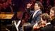 Cuomo Lin gesturing extravagantly at the piano Cuomo Lin gesturing extravagantly at the piano