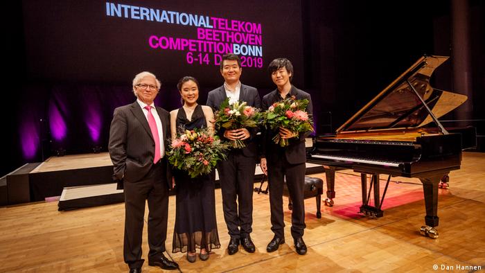The three prize winners with the jury chairman and artistic director Pavel Gililov