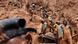 Men work in a gold mine on February 23, 2009 in Chudja, near Bunia, north eastern Congo. Men work in a gold mine on February 23, 2009 in Chudja, near Bunia, north eastern Congo.