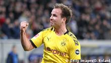 Dortmund's German midfielder Mario Goetze celebrates scoring the opening goal during the German First division Bundesliga football match TSG 1899 Hoffenheim v BVB Borussia Dortmund in Sinsheim, southern Germany, on December 20, 2019. (Photo by Daniel ROLAND / AFP) / DFL REGULATIONS PROHIBIT ANY USE OF PHOTOGRAPHS AS IMAGE SEQUENCES AND/OR QUASI-VIDEO (Photo by DANIEL ROLAND/AFP via Getty Images)