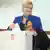 Croatian presidential candidate and incumbent president Kolinda Grabar-Kitarovic casts her vote