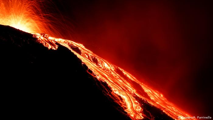Lava flows from the Stromboli volcano a day after an eruption unleashed a plume of smoke on the Italian island of Stromboli (Reuters/A. Parrinello)