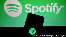 December 8, 2019, Kolkata, West Bengal, India: Illustration of Spotify app logo on mobile device and background. (Credit Image: Â© Debarchan Chatterjee/ZUMA Wire |