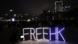 Protesters gather near a 'Free HK' sign during a rally in Hong Kong on New Year's Eve Protesters gather near a 'Free HK' sign during a rally in Hong Kong on New Year's Eve