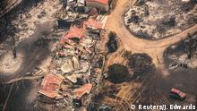 Property damaged by the East Gippsland fires in Sarsfield, Victoria, Australia January 1, 2020. AAP Image/News Corp Pool, Jason Edwards/via REUTERS ATTENTION EDITORS - THIS IMAGE WAS PROVIDED BY A THIRD PARTY. NO RESALES. NO ARCHIVES. AUSTRALIA OUT. NEW ZEALAND OUT.