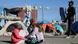 Migrant children sitting next to the Paso del Norte-Santa Fe international bridge in Mexico Migrant children sitting next to the Paso del Norte-Santa Fe international bridge in Mexico