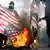 حرق للعلم الأمريكي في مظاهرات بطهران بعد مقتل قاسم سليماني