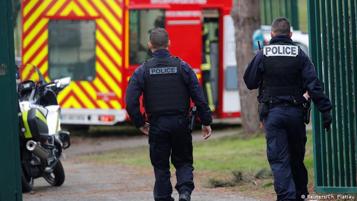 Police secure the area around a park near Paris where a knife attack took place