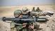 German Bundeswehr soldiers hold a handheld mortar-launcher German Bundeswehr soldiers hold a handheld mortar-launcher