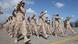 Soldiers of the Libyan Border Guard forces march in a military parade during a graduation ceremony of the first group of new border guards in Tripoli, Libya Soldiers of the Libyan Border Guard forces march in a military parade during a graduation ceremony of the first group of new border guards in Tripoli, Libya
