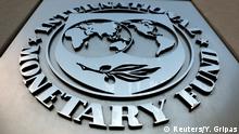 FILE PHOTO: The International Monetary Fund (IMF) logo is seen outside the headquarters building in Washington, U.S.,September 4, 2018. REUTERS/Yuri Gripas/File Photo