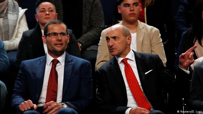 Robert Abela and Chris Fearne sit together at a Labour Party Congress in Paola, Malta