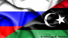 Waving flag of Libya and Russia