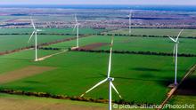30.10.2019 ODESA REGION, UKRAINE - OCTOBER 30, 2019 - A wind farm is situated among the agricultural fields in Odesa Region, southern Ukraine. |