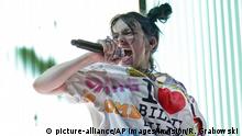 FILE - This June 9, 2019 file photo shows Billie Eilish performing during the When We All Fall Asleep tour in Chicago. Eilish and Lizzo, both nominated for the top four prizes at the Grammy Awards, are slated to perform at the Grammy Awards on Jan. 26 event, airing live on CBS. (Photo by Rob Grabowski/Invision/AP, File) | 