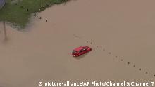 This image from a video, shows a submerged car on Gold Coast, Australia Saturday, Jan. 18, 2020. Heavy rain lashed parts of Australia’s New South Wales and Queensland states on Saturday causing flashfloods, while wildfires continue to burn in other parts of the country. (Australian Broadcasting Corporation, Channel 7, Channel 9 via AP) |