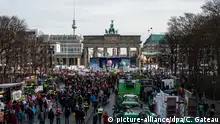 Protesters gather at Brandenburg Gate during Green Week in Berlin