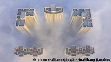 19.01.2020, China, Yuncheng: Die chinesische Stadt versinkt im Advektionsnebel. Nur die Wolkenkratzer ragen aus dem dichten Nebel heraus. Foto: Shang Jianzhou/XinHua/dpa +++ dpa-Bildfunk +++ |