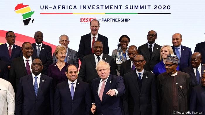 Britain's Prime Minister Boris Johnson poses with representatives of African countries during a family photo at the start of the UK-Africa Investment Summit in London