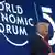 Presidente americano, Donald Trump, discursa em frente a painel com nome do Fórum Econômico Mundial