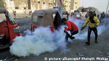 العراق ـ اشتباكات بين الشرطة والمتظاهرين خلال إزالة الحواجز