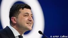 Ukraine's President Volodymyr Zelensky delivers a speech at the World Economic Forum (WEF) annual meeting in Davos, on January 22, 2020. (Photo by Fabrice COFFRINI / AFP)