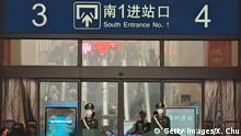 WUHAN, CHINA - JANUARY 22: Guards wearing face masks stand at Hankou Railway Station on January 22, 2020 in Wuhan, China. A new infectious coronavirus known as 2019-nCoV was discovered in Wuhan last week. Health officials stepped up efforts to contain the spread of the pneumonia-like disease which medical experts confirmed can be passed from human to human. Cases have been reported in other countries including the United States,Thailand, Japan, Taiwan, and South Korea. It is reported that Wuhan will suspend all public transportation at 10 AM on January 23, 2020. (Photo by Xiaolu Chu/Getty Images)