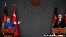 Turkish President Tayyip Erdogan and German Chancellor Angela Merkel attend a joint news conference in Istanbul, Turkey, January 24, 2020. REUTERS/Umit Bektas
