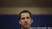 Leader of Venezuela's political opposition Juan Guaido listens to a question during a joint press conference with European Parliament members at the European Parliament in Brussels, Wednesday, Jan. 22, 2020. Intelligence police raided the office of Juan Guaidó on Tuesday, while the U.S.-backed opposition leader was travelling in Europe seeking to bolster support for his campaign to oust Venezuelan President Nicolás Maduro. (AP Photo/Francisco Seco) |