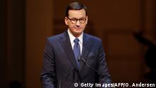 Polish Prime Minister Mateusz Morawiecki speaks at a memorial concert to commemorate the 75th anniversary of the liberation of the German Nazi death camp Auschwitz on January 27, 2020 at the Berlin State Opera. (Photo by Odd ANDERSEN / POOL / AFP) (Photo by ODD ANDERSEN/POOL/AFP via Getty Images)