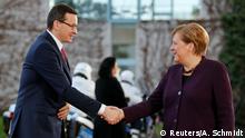 German Chancellor Angela Merkel welcomes Polish Prime Minister Mateusz Morawiecki at the Chancellery in Berlin, Germany, January 28, 2020. REUTERS/Axel Schmidt