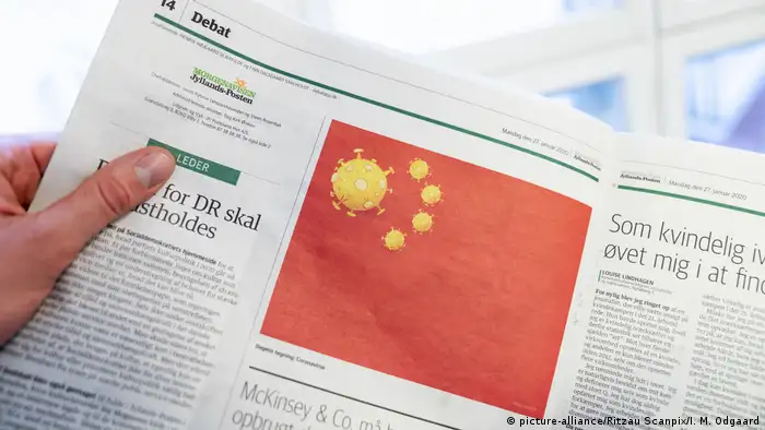 Karikatur von Coronavirus auf der chinesischen Flagge