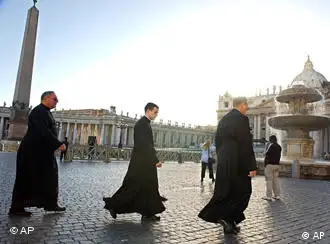 Three priests cross St. Peter's Square at the Vatican, Friday, Oct. 18, 2002. The Vatican rejected the U.S. Roman Catholic Church's new sexual abuse policy Friday, saying the sweeping zero-tolerance crackdown needed to be revised because elements conflict with universal church law.
