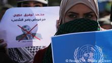العراق: قبعات حمراء وزرقاء تكرس الخلاف حول علاوي