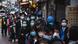 People in Hong Kong wait in a line outside a store to try and purchase more face masks amid an outbreak of a new type of coronavirus People in Hong Kong wait in a line outside a store to try and purchase more face masks amid an outbreak of a new type of coronavirus