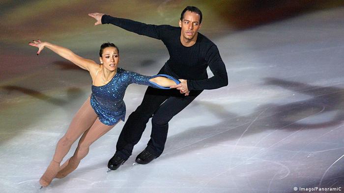 Sarah Abitbol performs on the ice with her partner in 2002