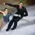 Sarah Abitbol performs on the ice with her partner in 2002