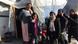 Refugee family in Moria camp on Lesbos, Greece Refugee family in Moria camp on Lesbos, Greece
