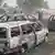 Nigeria | Niedergebrannte Fahrzeuge in Auno