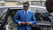 June 24, 2013***
(FILES) In this file photograph taken on June 24, 2013, Teodorin Obiang Nguema, the son of Equatorial Guinea's president Teodoro Obiang and the country's vice-president in charge of security and defence, arrives at Malabo Stadium in Malabo, to attend ceremonies to celebrate his 41st birthday. - The Paris appeals court on February 10, 2020, has confirmed a three-year suspended jail sentence for Teodorin Obiang, the son of Equatorial Guinea's leader and its vice president, on graft charges. The court also ordered Obiang to pay 30 million euros ($32.9 million) -- a fine suspended in the initial ruling in 2017. Obiang, the son of Equatorial Guinea's leader Teodoro Obiang Nguema who has ruled the west African state for the last 40 years, was convicted of using public money to fund a jet-set lifestyle in Paris. (Photo by JEROME LEROY / AFP)