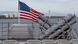 An American flag on the USS Normandy An American flag on the USS Normandy