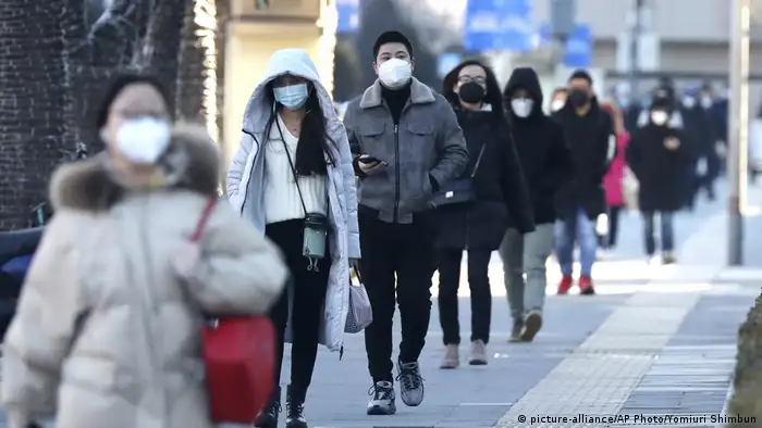 Commuters with masks