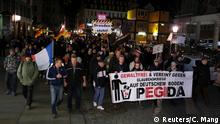 Anti-Islam Pegida rally meets resistance in Dresden 