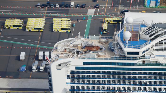 Buses line up to take the diamond princess passengers off the cruise ship