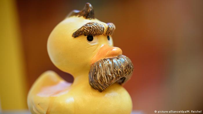 A close-up of a 'Nietzsche duck' pointing the way to a special section in the Duchess Anna Amalia Library in Weimar
