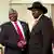 Salva Kiir and Riek Machar shake hands