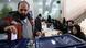 A man casts his vote during parliamentary elections at a polling station in Tehran, Iran February 21, 2020 A man casts his vote during parliamentary elections at a polling station in Tehran, Iran February 21, 2020